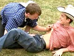 Adorable lil cowboys enjoy oral caresses on grass